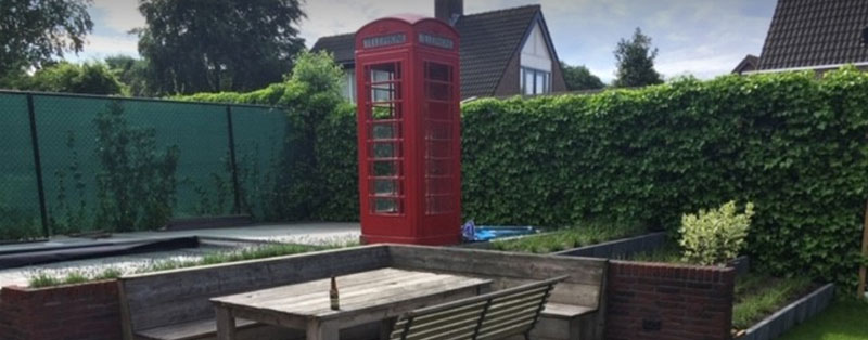 garden with English telephone booth